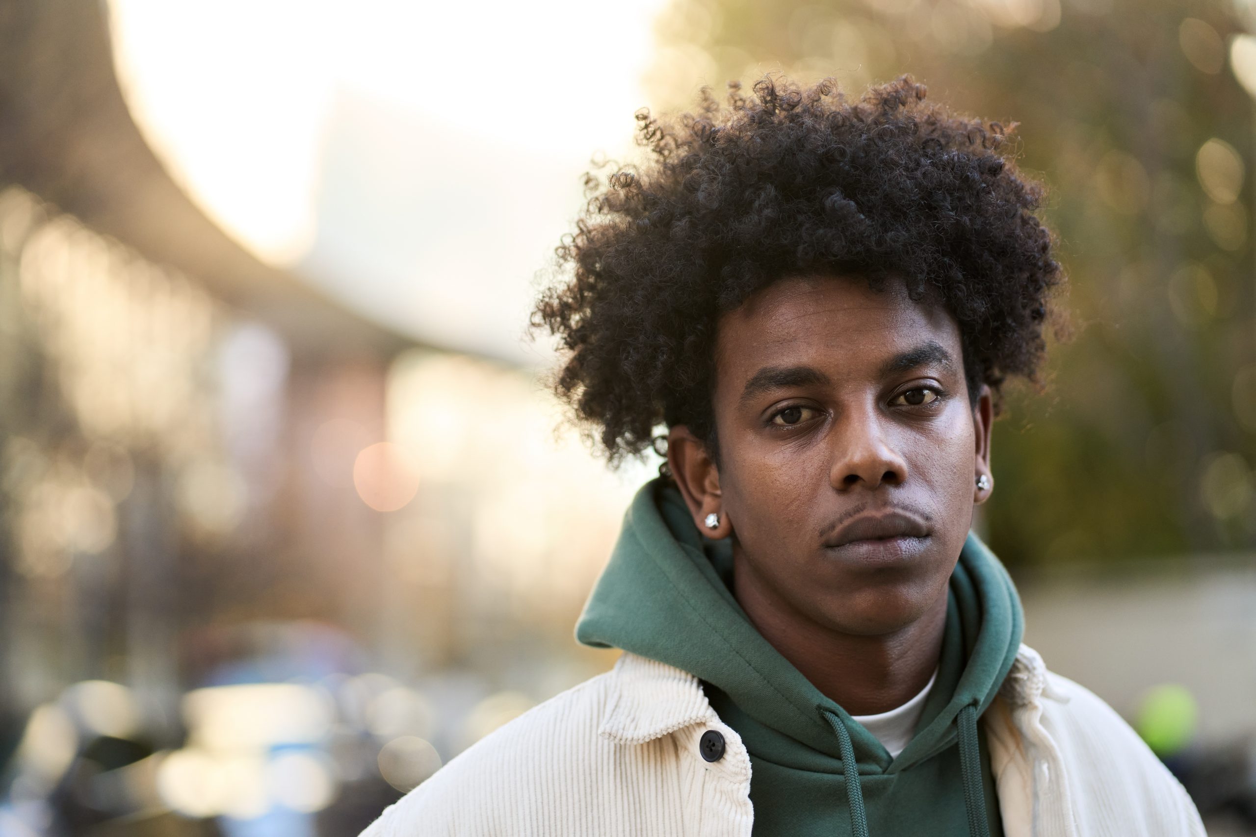 Cool,Sad,Lonely,Young,African,American,Guy,Standing,At,City