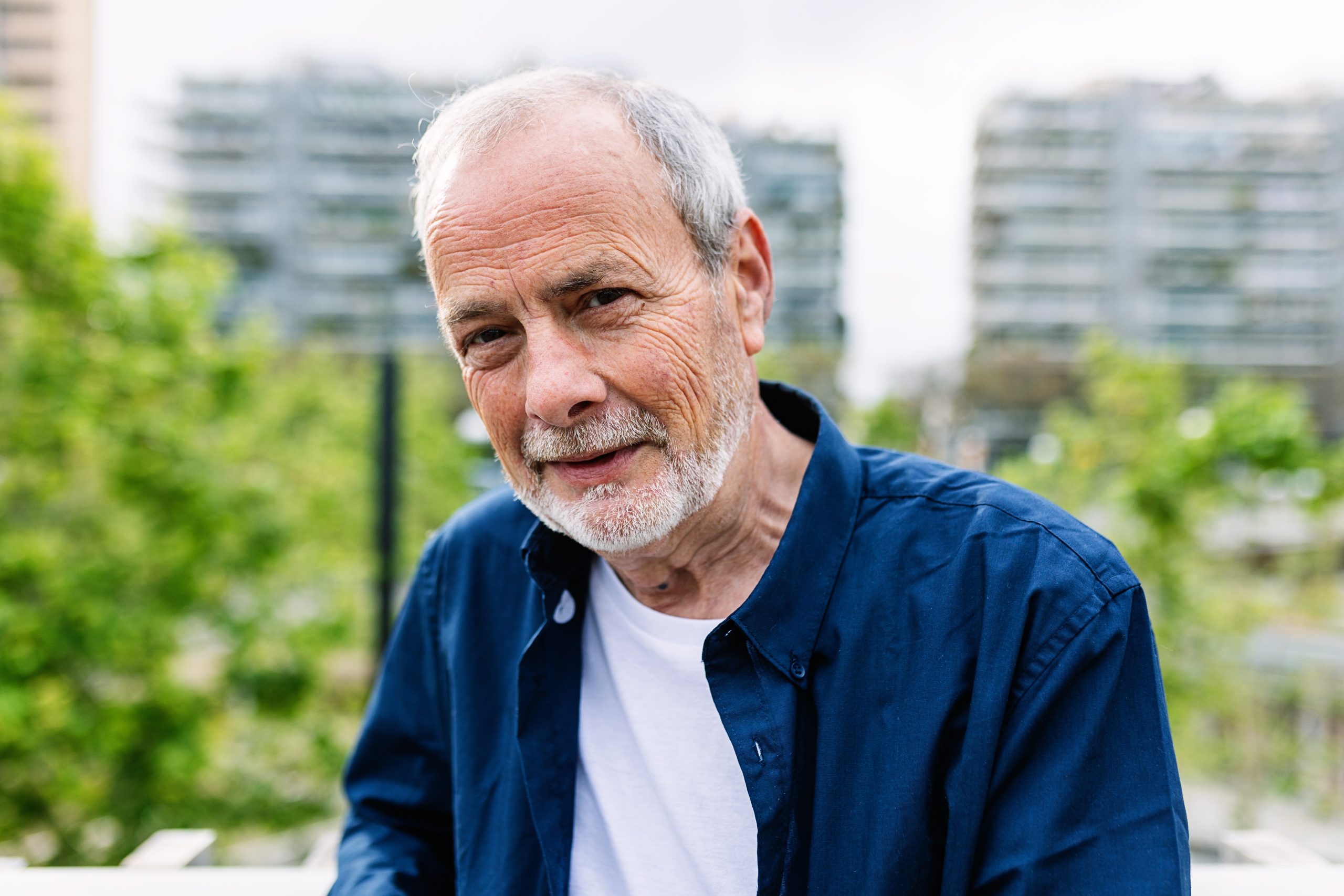 Happy,Senior,Man,With,Grey,Hair,And,Beard,Smiling,At